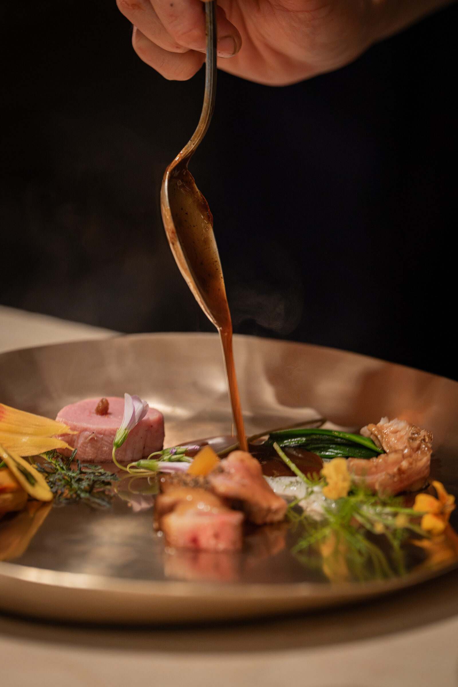 Pork tenderloin, collar, and jowl with summer seasonal vegetables plating