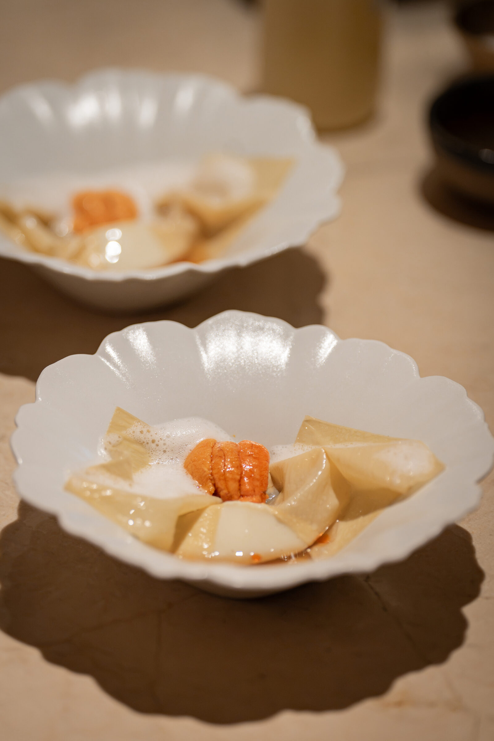 Cheongseoritae black soybean soft tofu, baektae soybean yuba, mussel foam plating